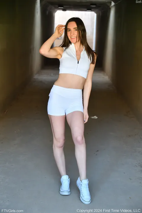 Tall Brunette Shows Off Her Big Tits in High Heels Outdoors – photo 12 of 15