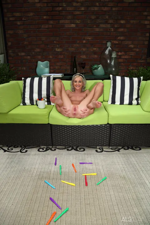 Tallie Lorain: Slim Blonde Fucks a Dildo on the Sofa in Heels – photo 13 of 16