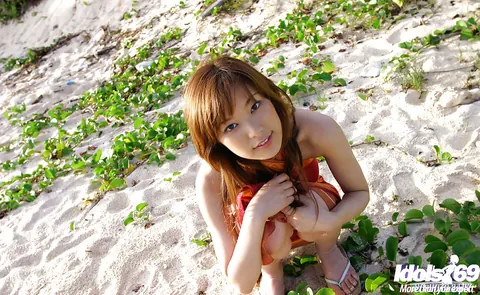 Yua Aida: Japanese Babe Shows Her Big Tits and Hairy Pussy on the Beach – photo 14 of 16