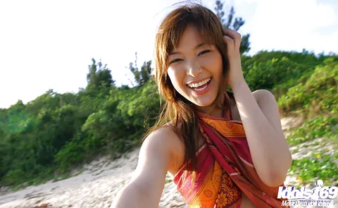 Yua Aida: Japanese Babe Shows Her Big Tits and Hairy Pussy on the Beach – photo 15 of 16
