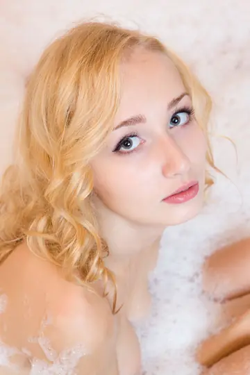 Mature Blonde Spreads Her Pussy in the Bathroom