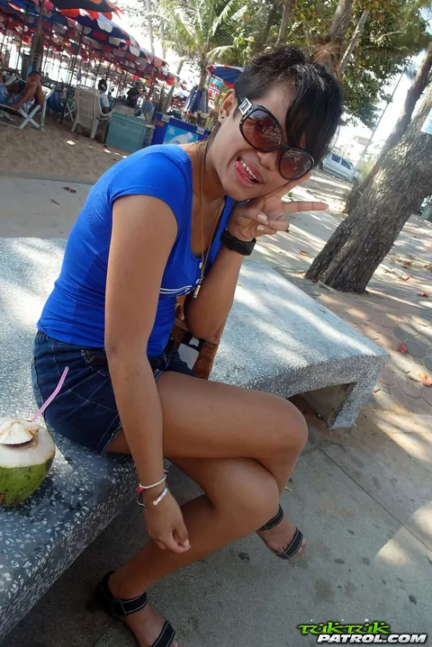 Thai Beauty in Glasses Strips and Spreads Outdoors – photo 2 of 20
