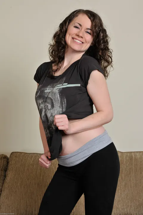 Curly Amateur Strips and Spreads Her Hairy Pussy – photo 3 of 20