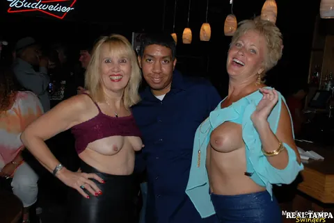 Mandi McGraw: Tall Blonde MILF with Enhanced Tits Undresses for Public Group Sex – photo 9 of 20