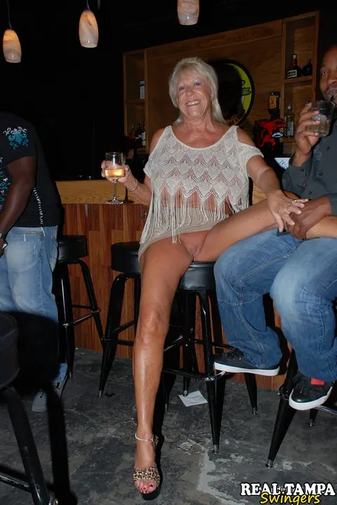 Mandi McGraw: Tall Blonde MILF with Enhanced Tits Undresses for Public Group Sex – photo 11 of 20