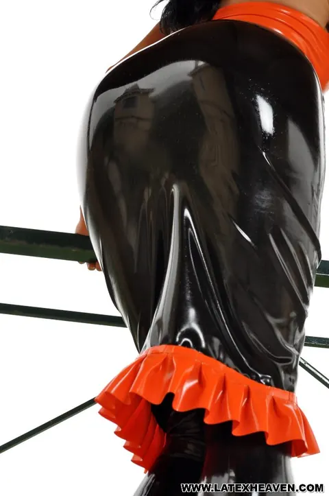 Stacey Lacey: Slim British MILF Poses in a Latex Skirt on the Balcony – photo 8 of 12