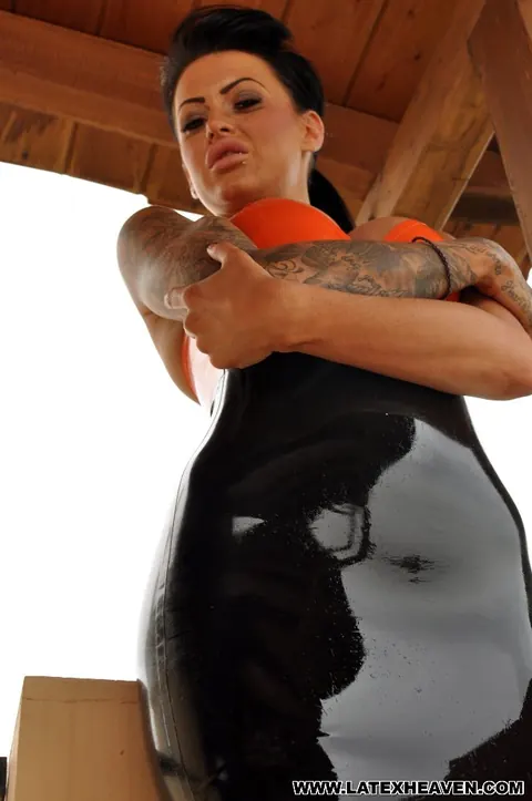 Stacey Lacey: Slim British MILF Poses in a Latex Skirt on the Balcony – photo 5 of 12