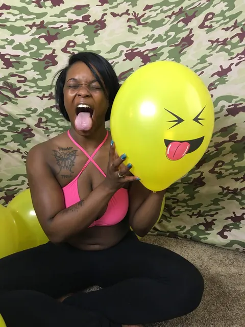 Kassey Starr: Ebony Brunette Shows Off Cleavage with a Balloon Outdoors – photo 8 of 18