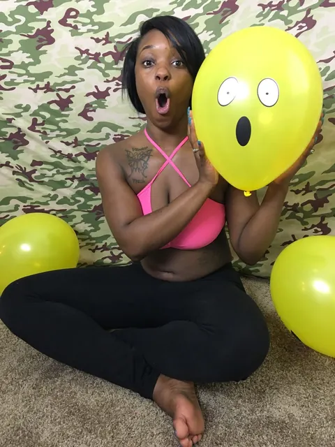 Kassey Starr: Ebony Brunette Shows Off Cleavage with a Balloon Outdoors – photo 11 of 18