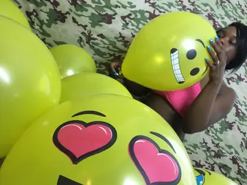 Kassey Starr – Ebony Brunette Shows Off Cleavage with a Balloon Outdoors