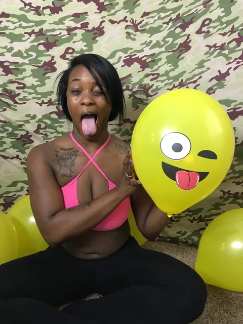 Kassey Starr: Ebony Brunette Shows Off Cleavage with a Balloon Outdoors – photo 7 of 18