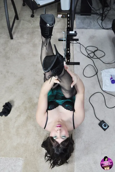 Trans Woman in a Corset and Stockings Toys Her Ass – photo 12 of 16