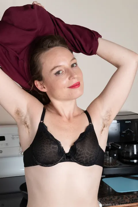 Ana Molly: Pale Redhead MILF Undresses and Spreads Her Hairy Pussy in the Kitchen – photo 4 of 21