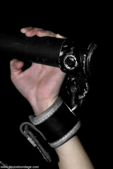 Brunette in a Skirt Gets Whipped and Dildo-Fucked in Metal Bondage