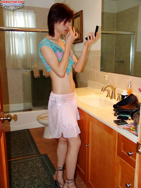 Slim Asian Trans Woman Strips Off Her Top and Poses Nude – photo 1 of 16