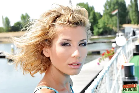 Slim Short-Haired Woman Poses in a Bikini by the Pool – photo 4 of 16