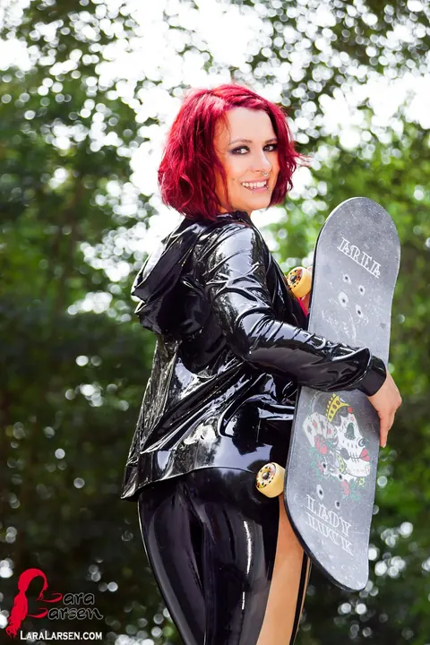Lara Larsen: Redhead in Lingerie and Latex Unzips at the Skate Park – photo 6 of 12