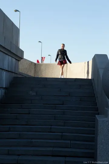 Slim Woman Lifts Her Skirt and Spreads Her Hairy Pussy Outdoors