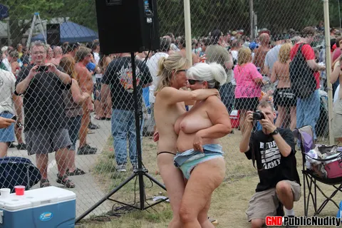 BBW with Big Tits Strips Nude on Outdoor Stage – photo 11 of 12
