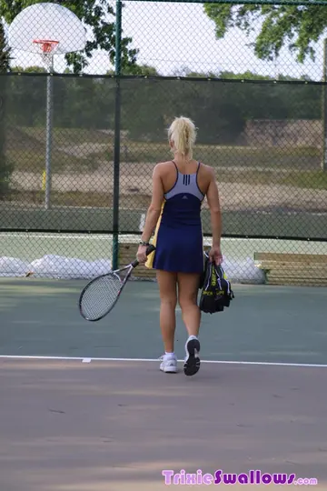 Busty Athletic Woman in Glasses Gives a Blowjob on Tennis Court