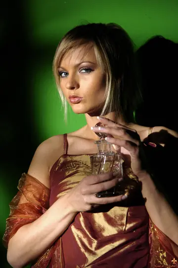 Slim Czech MILF in a Skirt Applies Perfume and Shows Her Tits