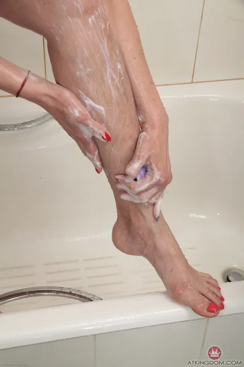 Redhead with Short Hair Spreads Her Hairy Pussy in the Bathroom – photo 8 of 21