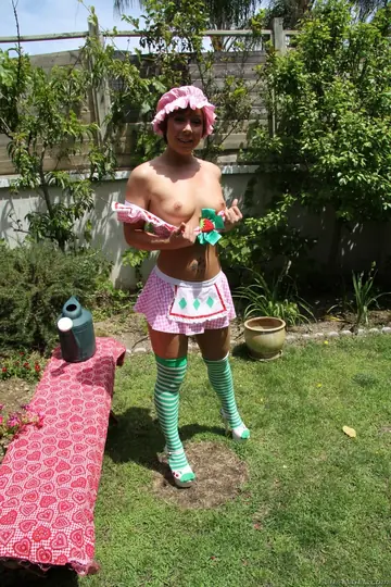 Brunette in Maid Cosplay Bares Her Ass Outdoors