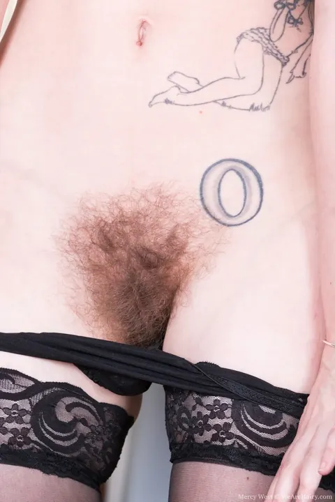Mercy West: Petite Brunette Rolls Down Her Stockings to Show Her Hairy Pussy – photo 8 of 21