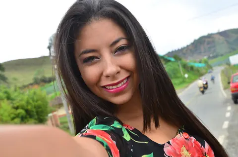 Latina Brunette Bares Her Natural Tits and Oils Them Outdoors – photo 1 of 21