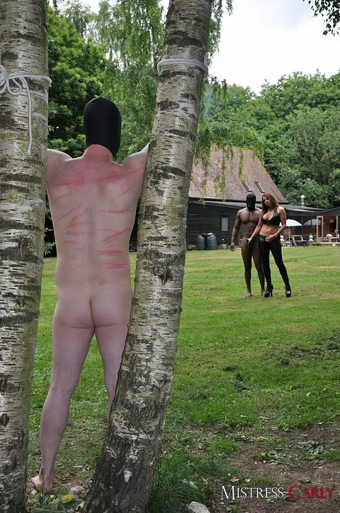 Mistress Carly: Busty British MILF in Latex Dominates Interracial Threesome Outdoors – photo 7 of 15