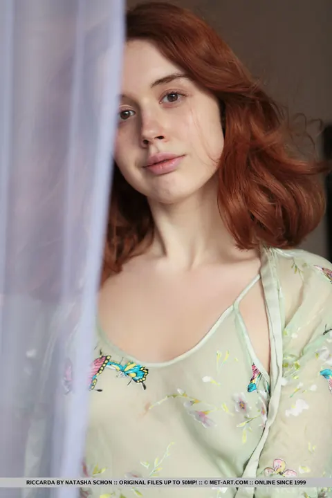 European Redhead Strips Off Her Sheer Dress and Poses Nude – photo 2 of 18