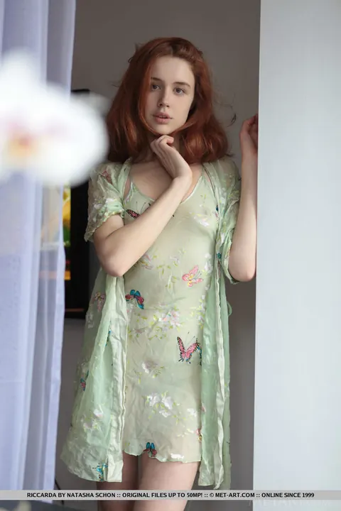European Redhead Strips Off Her Sheer Dress and Poses Nude – photo 1 of 18