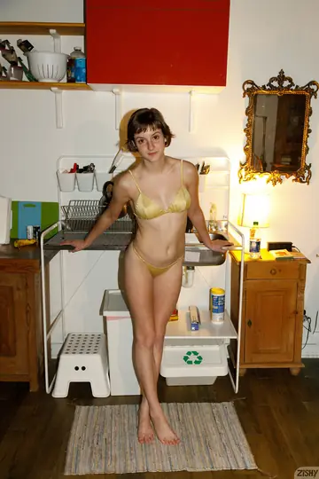 Amateur with Short Hair Poses Nude in the Forest and Bathroom