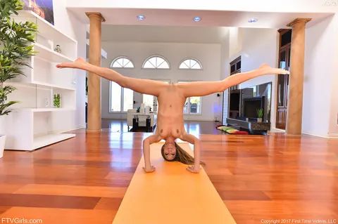 Petite Spanish Brunette Stretches Naked on the Gym Floor – photo 14 of 21