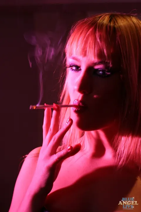 Blue Angel: Blonde European Babe Poses Nude While Smoking – photo 10 of 17