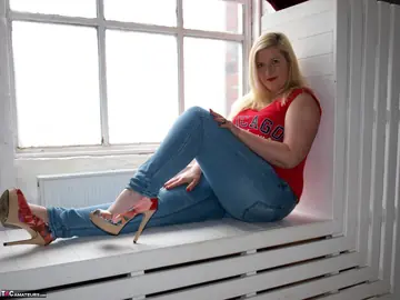 Thick Blonde MILF Undresses by the Window