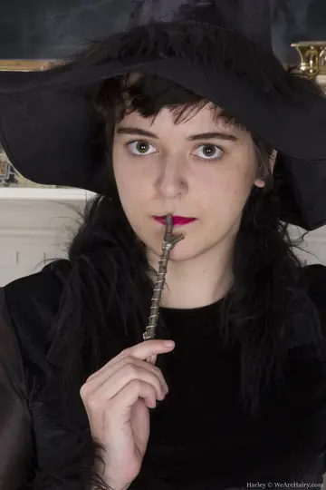 Black-Haired Woman with Short Hair Spreads Her Hairy Pussy