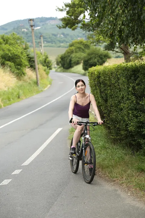 Daphne J: Two Brunettes Lick and Finger Each Other on Bikes in the Forest – photo 2 of 21