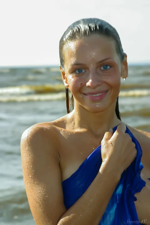 Woman Spreads Her Legs on the Sandy Beach – photo 10 of 21