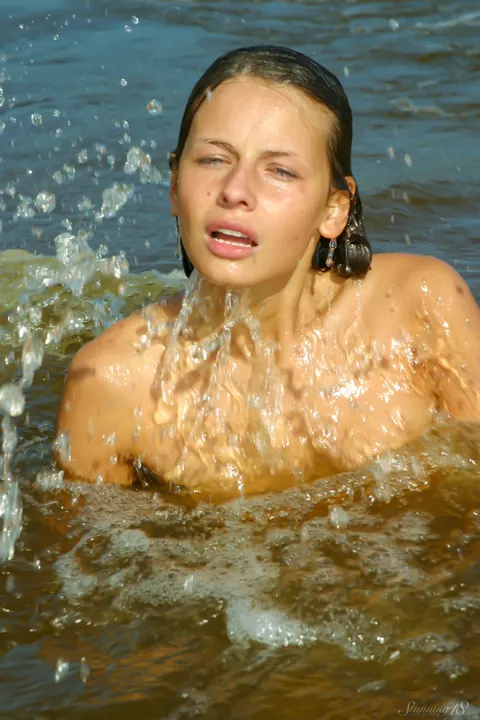 Woman Spreads Her Legs on the Sandy Beach – photo 6 of 21