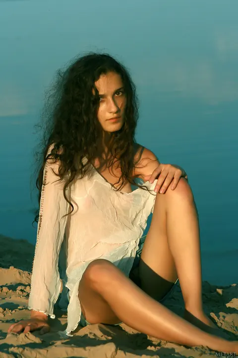 Slim Curly Babe Shows Her Small Tits and Hairy Bush on the Beach – photo 11 of 21