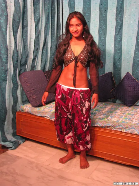 Indian Brunette Undresses to Show Her Shaved Pussy – photo 1 of 15
