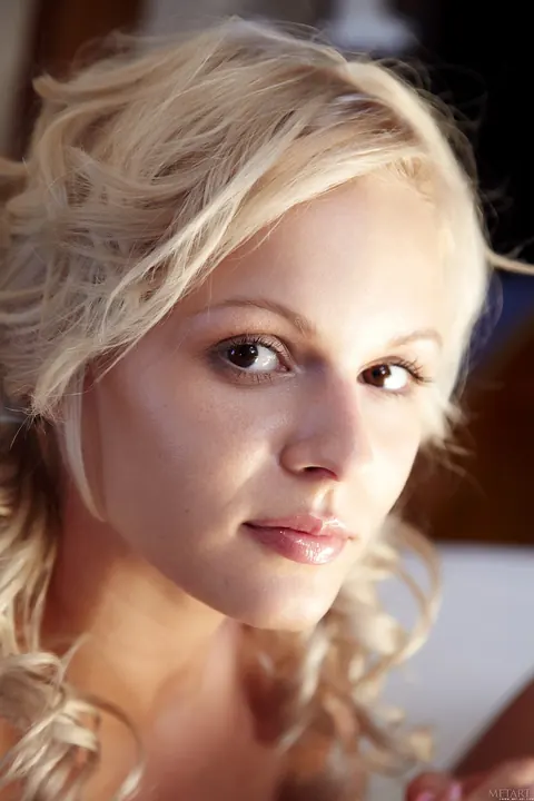 Curly Blonde Pulls Her Panties Aside and Spreads Her Pussy – photo 11 of 21