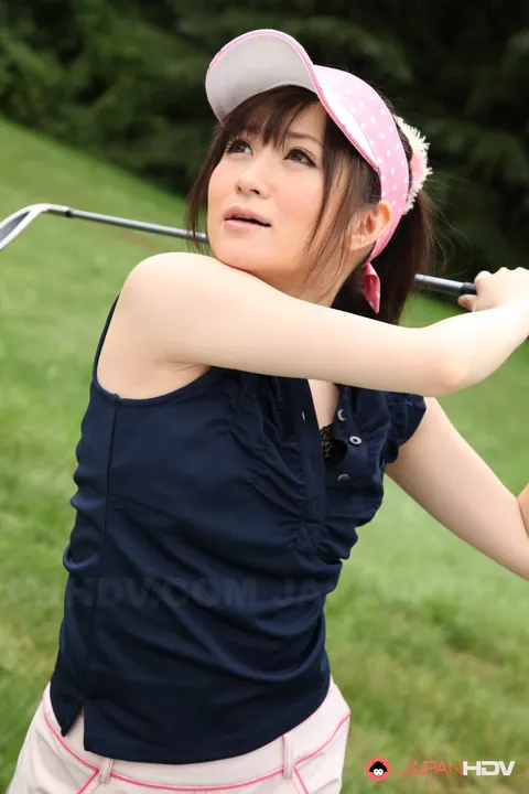 Japanese Brunette Swings Golf Club and Spreads Outdoors – photo 3 of 15
