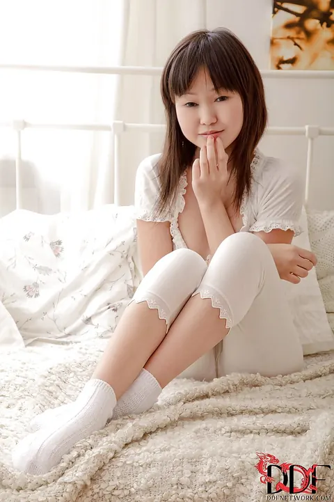 Asian Brunette Removes Pants and Fingers Her Pussy – photo 2 of 16