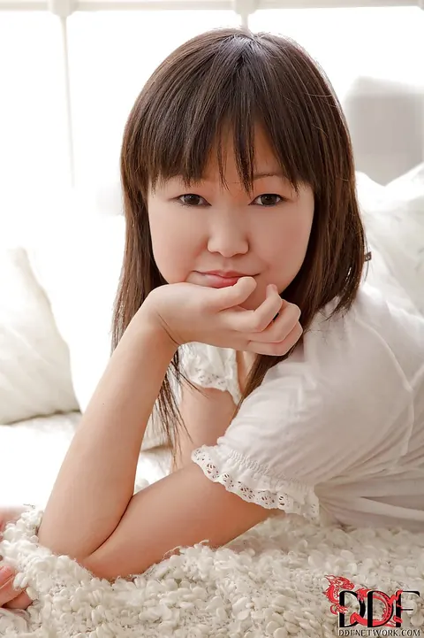 Asian Brunette Removes Pants and Fingers Her Pussy – photo 3 of 16