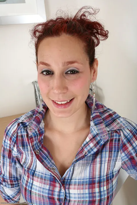 Busty Redhead MILF Strips to Reveal Her Hairy Pussy – photo 1 of 21