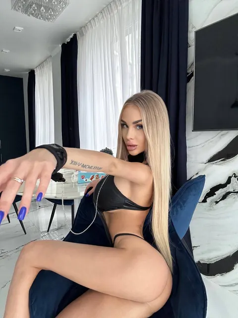 Slim Ukrainian Blonde with Big Tits Poses in Lingerie and a Bikini – photo 7 of 10