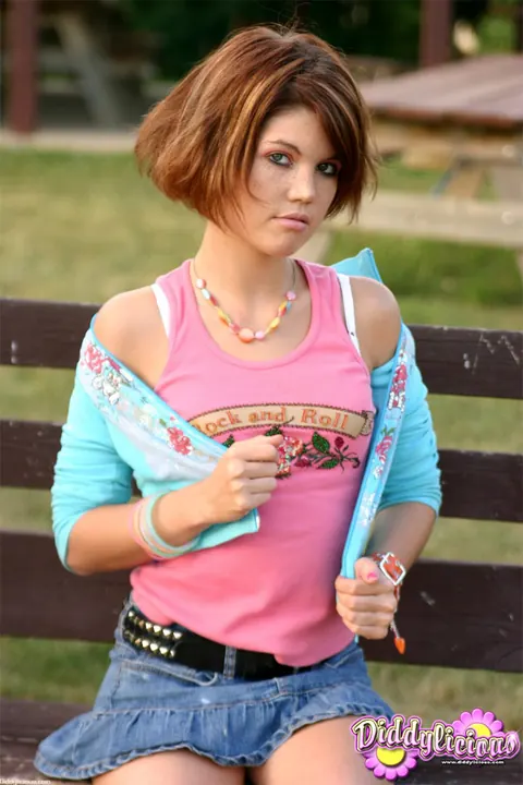 Diddylicious: Slim Redhead Lifts Her Skirt and Flashes Her Ass on a Park Bench – photo 1 of 12