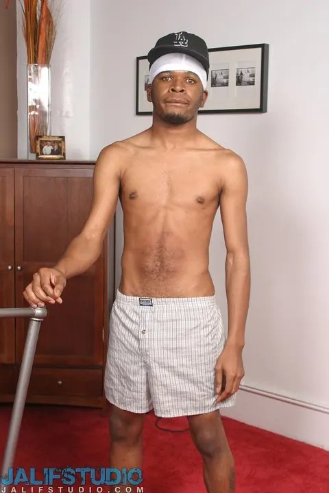 Hairy Black Man Strips Nude and Shows His Huge Cock – photo 8 of 21